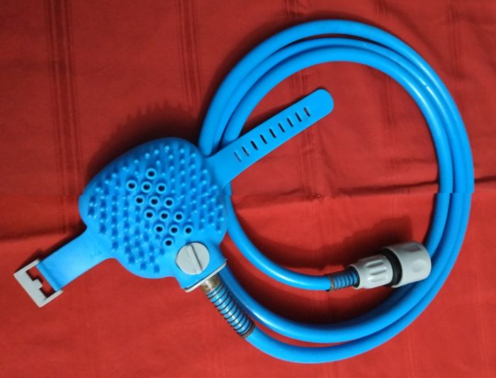 Chuveiro massajador para animais