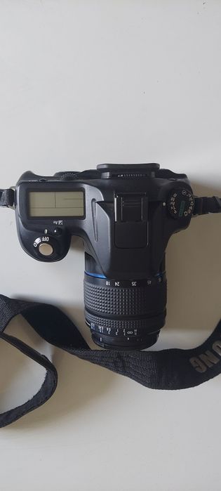 Фотоаппарат бренда  Samsung GX-1S и фотоаппарат SilverCrest
