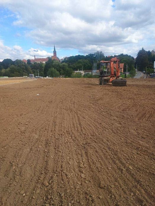 Usługi koparko ładowarką mecalac 12