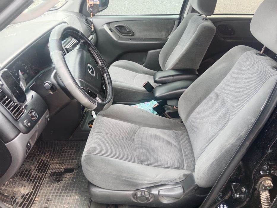 Мазда трибют повний привод