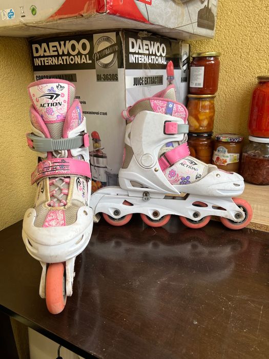 Ролики жіночі action