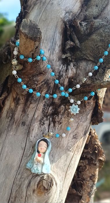 Terço feito com pecas em biscuit