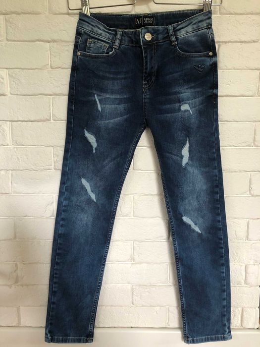 Dziewczęce jeansy rozmiar 146