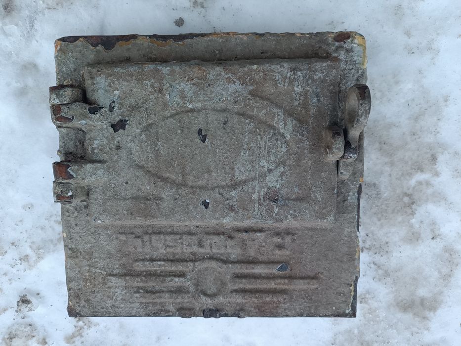 Чавунні дверцята до пічки