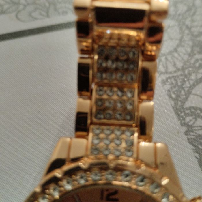 Relógio dourado Geneva