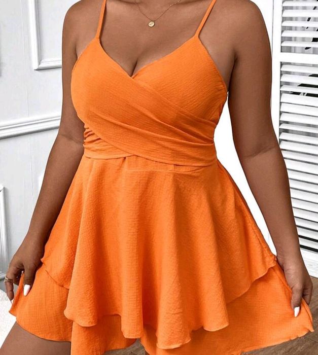 Vendo macacão em tons de laranja tamanho 2xl novo com etiqueta