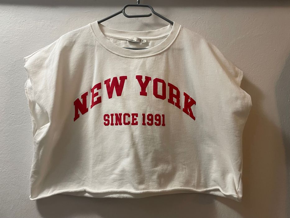 Luźna koszulka biała rozmiar M-XL do pępka