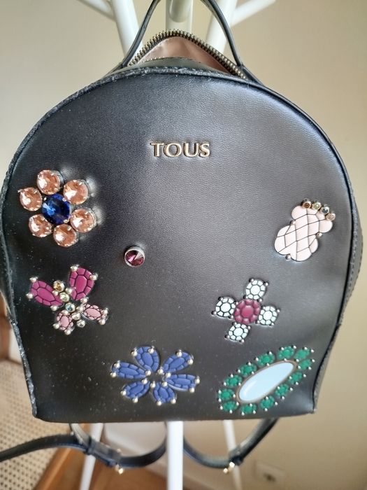 Mochila preta da tous  tenho certificado de autenticidade