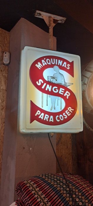 Reclame luminoso Singer