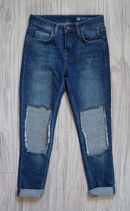 Spodnie jeans z dziurami,nowe,r.S