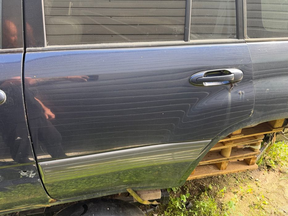 drzwi lewy tył toyota land cruiser hdj 100 oryginał 98-06