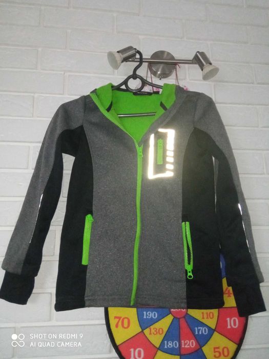 Paczka ubrań dla chłopca kurtka spodnie bezrękawnik 128-140