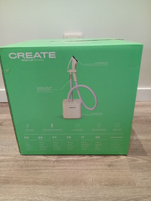 Ferro de engomar de vapor vertical com base