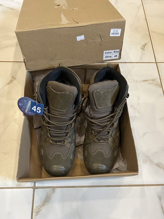 Продам нові черевикі олива