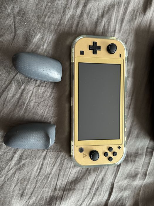 Nintendo Switch Lite Zelda + 128GB Card + Case + Case64171760267651123