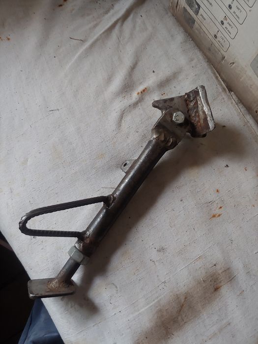 Бокова підніжка  з регулюванням по висоті. Ручна робота