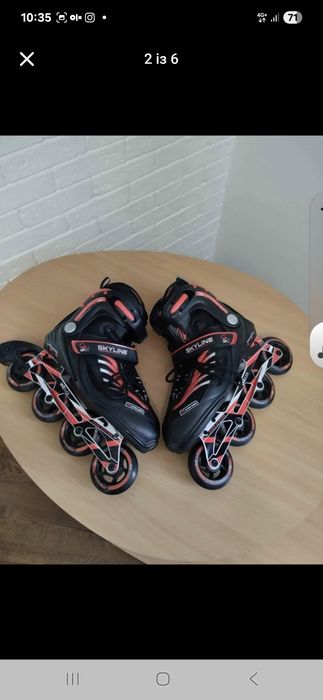 Продам ролики ,наколінники, шолом