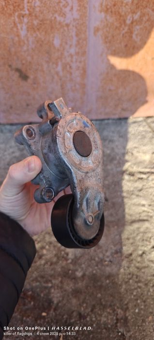 Натяжник ременя генератора Peugeot Partner/Citroen Berlingo 1.6HDi 05-