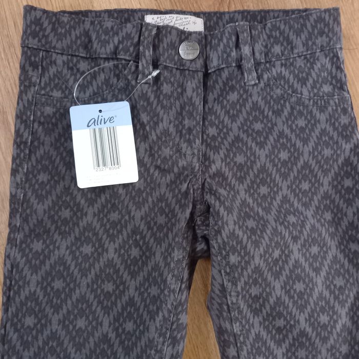 Spodnie dla dziewczynki r.128 Nowe