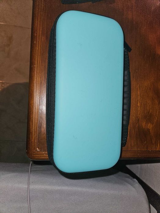 Vendo nitendo switch lite + capa e pelicula e 2 jogos