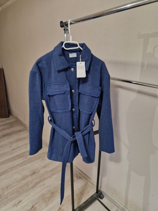 Nowy damski płaszcz