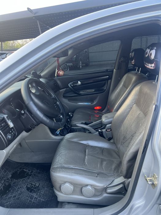 Шевроле Еванда 2.0