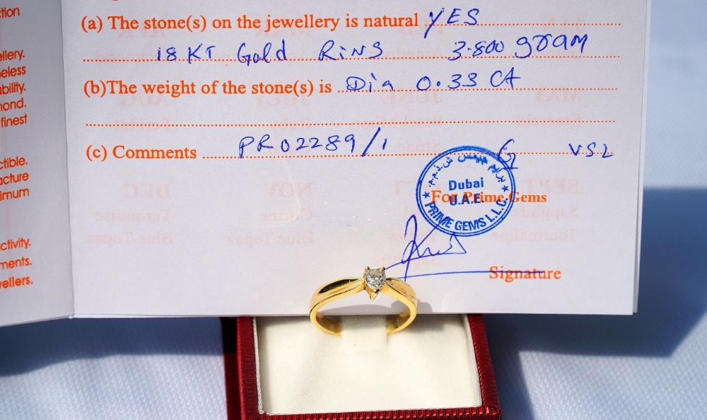 Pierścionek z brylantem 18K(ct) próba 750 brylant-0.33 ct