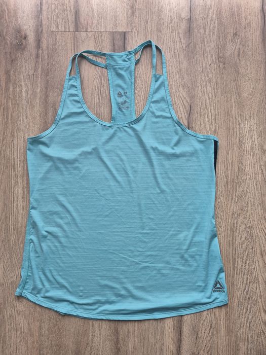 Bokserka koszulka treningowa Reebok M
Kolor miętowy
Normalne ślady uży