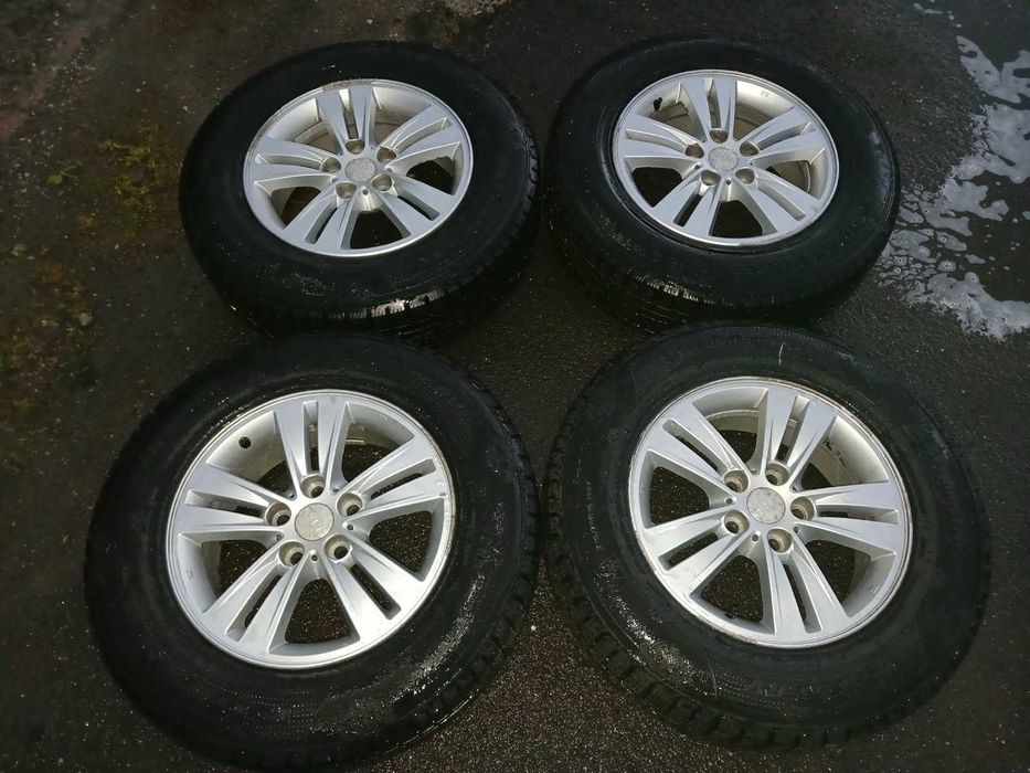 Felgi aluminiowe 16 Kia Sportage z oponami zimowymi 215/70R16