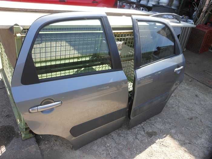 Drzwi tylne Prawe Suzuki SX4 09r