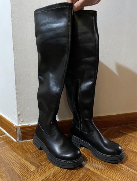 Botas a cima do joelho