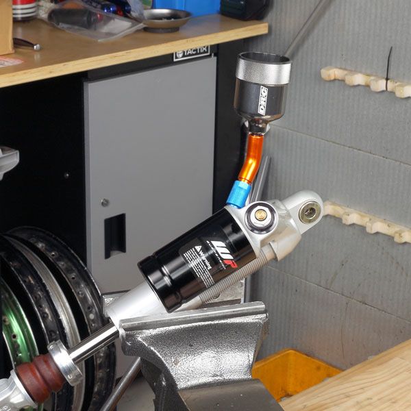 DRC rear suspension Bleed Cup