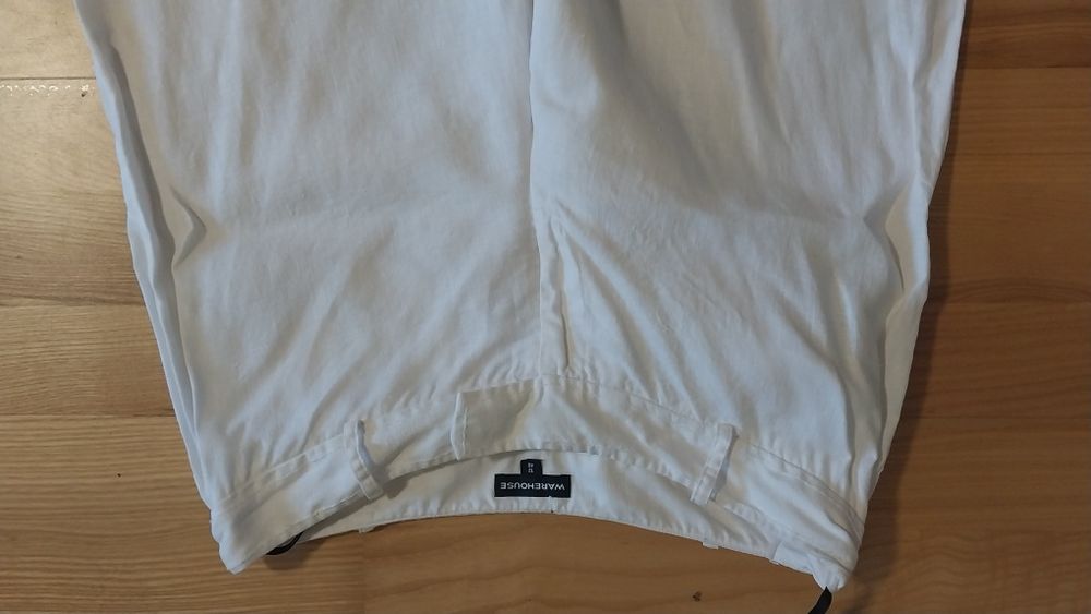 Продам  женские белые льняные штаны  Warehouse  оригинальные.