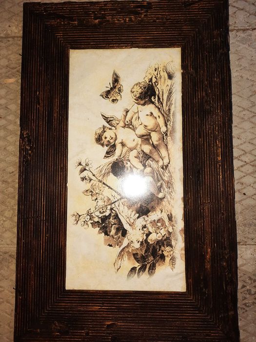 Obraz w ramce ze stuletnich bali