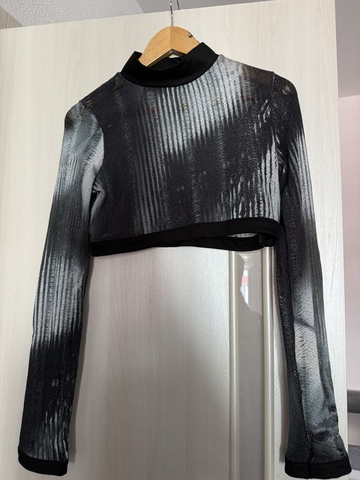 Трендовий топ рванка гарно переливається