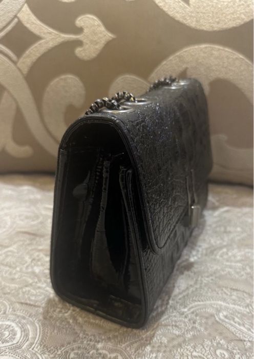 Жіноча шкіряна сумочка .