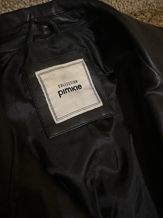 Продам  чорну косуху