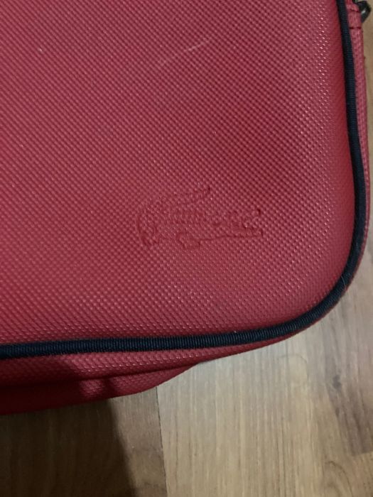 Malas lacoste vermelhas