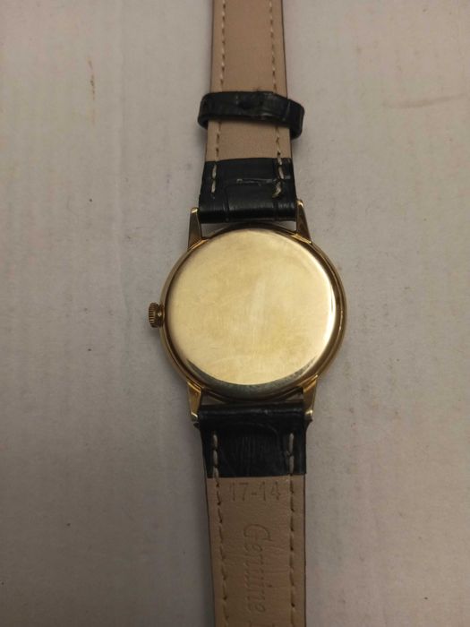 Omega Geneve złoty 18 K zegarek męski
