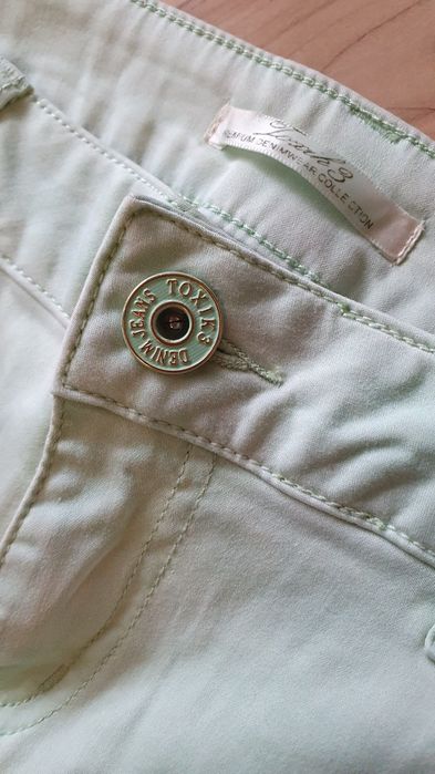 Nowe spodnie jeansy damskie miętowe cygaretki rurki  Toxik3 L 40