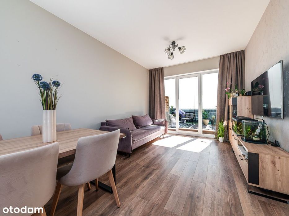 Nowoczesny segment z garażem i ogródkiem 105,09m2