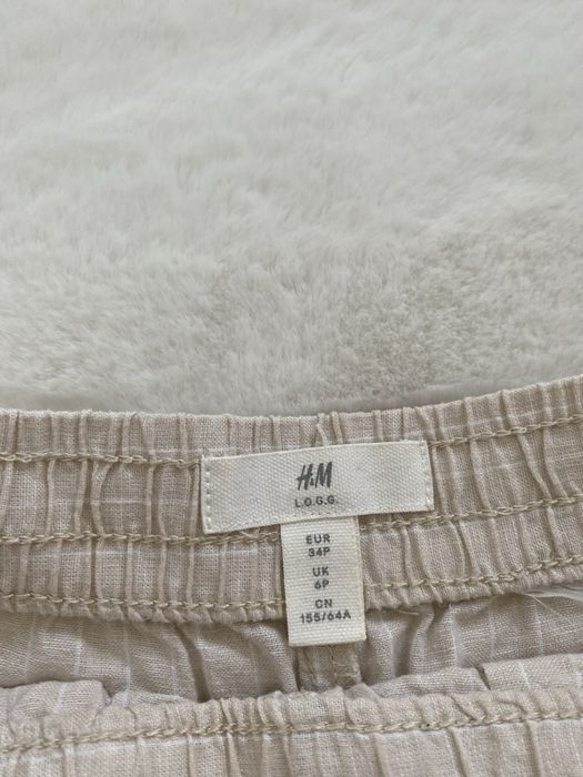 Beżowe krótkie spodenki w paseczki materiałowe S 36 H&M basic
