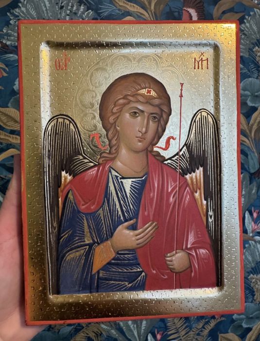 Three handmade icons on gold background. Jesus Christ, Madonna, archangel Michael.