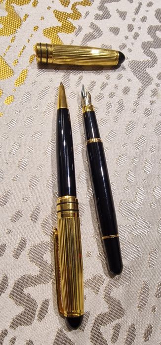 Conjunto canetas douradas