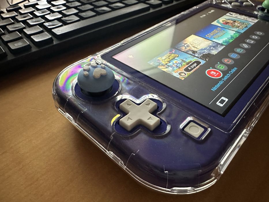 Nintendo Switch Lite + 2 jogos e extras