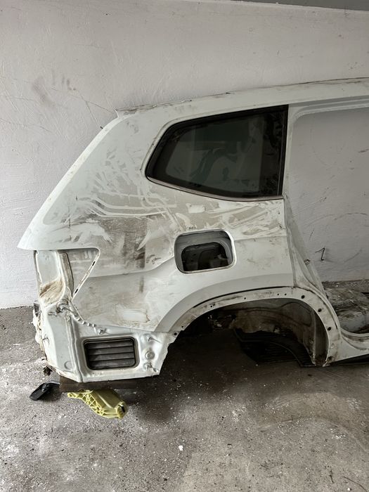 VW Atlas błotnik tył lewy tylny