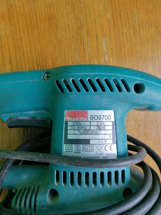 Шлифмашинка макита Makita corporation japan ВО3700   180W