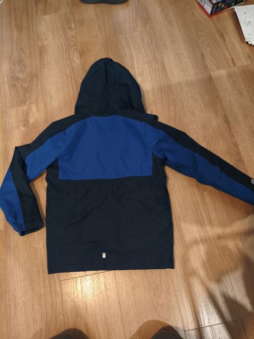 Kurtka przejściowa przeciwdeszczowa  z latarką 158 cm