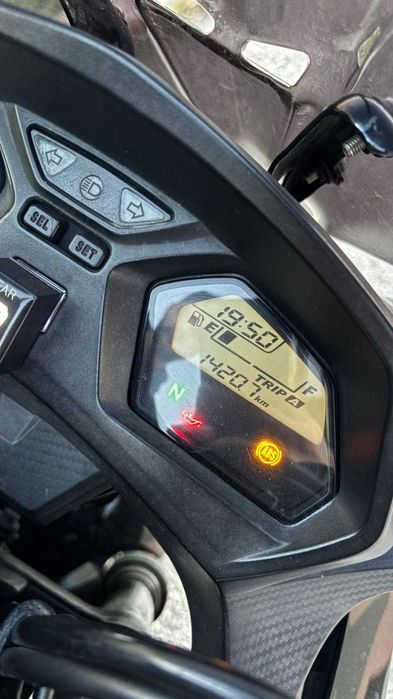 Mota CBR 650F e mochila da alpinestars