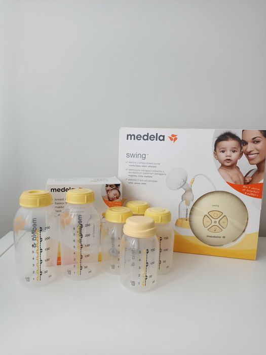 Laktator medela swing + butelki
